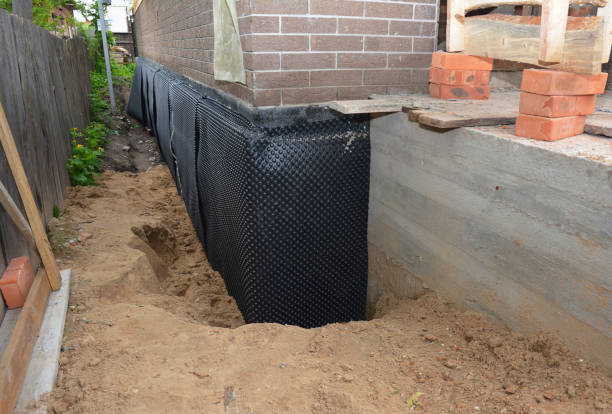 SJ Waterproofing Pros technician performing targeted Interior Drainage System assessment in Hatfield, PA